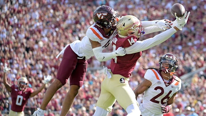 Oct 7, 2023; Tallahassee, Florida, USA; Florida State Seminoles wide receiver Keon Coleman (4) fails to secure a catch as Virginia Tech Hokies cornerback Mansoor Delane (4) defends during the first half at Doak S. Campbell Stadium. Mandatory Credit: Melina Myers-Imagn Images Oct 7, 2023; Tallahassee, Florida, USA; Florida State Seminoles wide receiver Keon Coleman (4) fails to secure a catch as Virginia Tech Hokies cornerback Mansoor Delane (4) defends during the first half at Doak S. Campbell Stadium. Mandatory Credit: Melina Myers-Imagn Images