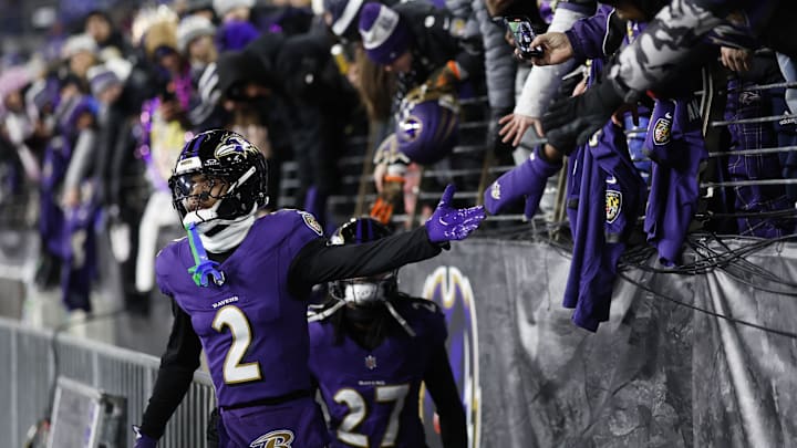 Jan 11, 2025; Baltimore, Maryland, USA; Baltimore Ravens cornerback Nate Wiggins (2) greets fans before warm up in an AFC wild card game against the Pittsburgh Steelers at M&T Bank Stadium. Mandatory Credit: Geoff Burke-Imagn Images