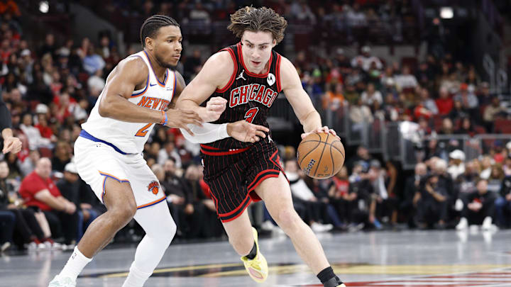 Oct 31, 2025; Chicago, Illinois, USA; Chicago Bulls guard Josh Giddey (3) drives to the basket against New York Knicks guard Miles McBride (2) during the first half at United Center. Mandatory Credit: Kamil Krzaczynski-Imagn Images