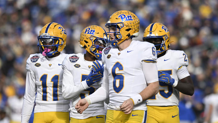 Dec 27, 2025; Annapolis, MD, USA; Pittsburgh Panthers quarterback Mason Heintschel (6) takes the field with teammates during the first half of the Military Bowl against the East Carolina Pirates at Navy-Marine Corps Stadium. Mandatory Credit: Tommy Gilligan-Imagn Images