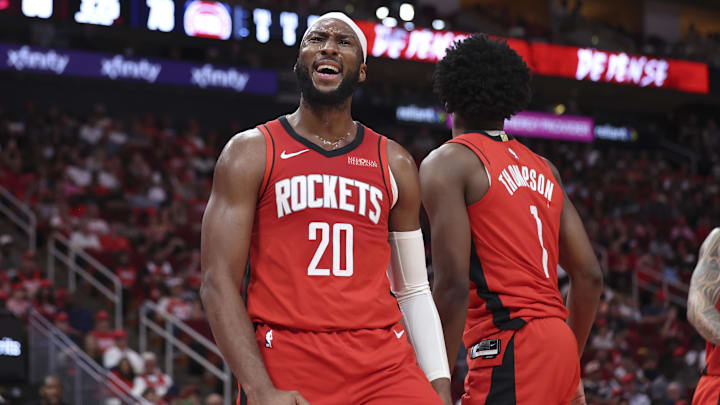 Oct 24, 2025; Houston, Texas, USA; Houston Rockets guard Josh Okogie (20) reacts after a play during the third quarter against the Detroit Pistons at Toyota Center. Mandatory Credit: Troy Taormina-Imagn Images