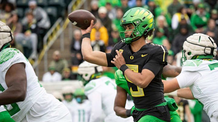 Oregon quarterback Dante Moore throws out a pass during the Oregon Ducks’ Spring Game Saturday, April 27. 2024 at Autzen Stadium in Eugene, Ore. Oregon quarterback Dante Moore throws out a pass during the Oregon Ducks’ Spring Game Saturday, April 27. 2024 at Autzen Stadium in Eugene, Ore.