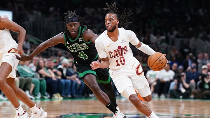 May 15, 2024; Boston, Massachusetts, USA; Cleveland Cavaliers guard Darius Garland (10) drives the ball against Boston Celtics guard Jrue Holiday (4) in the first quarter during game five of the second round for the 2024 NBA playoffs at TD Garden. Mandatory Credit: David Butler II-Imagn Images
