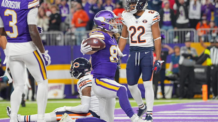 Vikings tight end T.J. Hockenson celebrates a touchdown catch against the Bears.