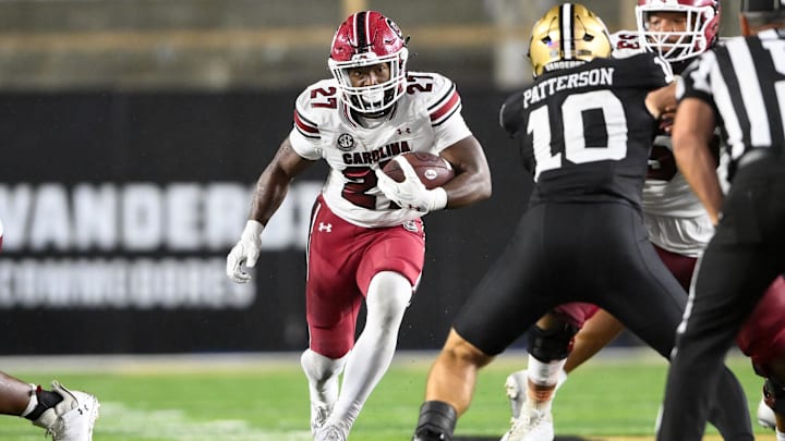 Nov 9, 2024; Nashville, Tennessee, USA;  South Carolina Gamecocks running back Oscar Adaway III (27) runs the ball against the Vanderbilt Commodores during the second half at FirstBank Stadium. Mandatory Credit: Steve Roberts-Imagn Images