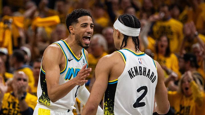 Apr 29, 2025; Indianapolis, Indiana, USA; Indiana Pacers guard Andrew Nembhard (2) celebrates a made basket with  guard Tyrese Haliburton (0) during game five of the first round for the 2024 NBA Playoffs against the Milwaukee Bucks  at Gainbridge Fieldhouse. Mandatory Credit: Trevor Ruszkowski-Imagn Images