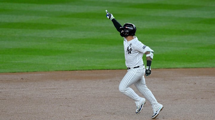Oct 29, 2024; New York, New York, USA; New York Yankees second baseman Gleyber Torres (25) celebrates after hitting a three-run home run during the eighth inning against the Los Angeles Dodgers in game four of the 2024 MLB World Series at Yankee Stadium. Mandatory Credit: John Jones-Imagn Images
