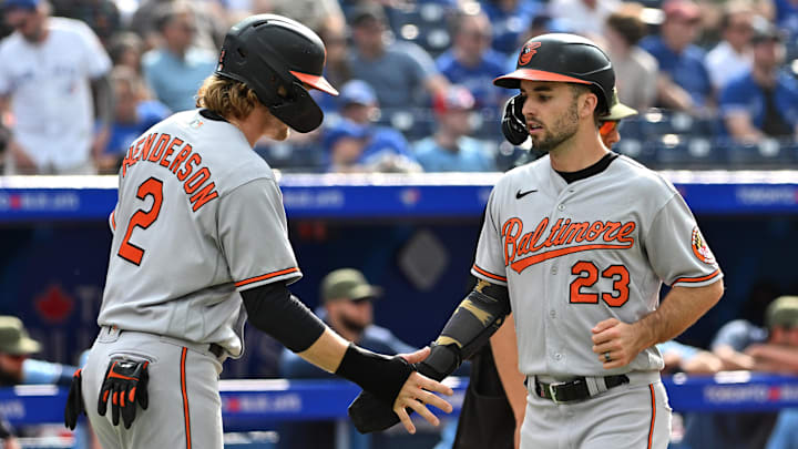 May 21, 2023; Toronto, Ontario, CAN; Baltimore Orioles pinch hitter Terrin Vavra (23) is greeted by third baseman Gunnar Henderson after scoring against the Toronto Blue Jays in the 11th inning at Rogers Centre. Mandatory Credit: Dan Hamilton-Imagn Images May 21, 2023; Toronto, Ontario, CAN; Baltimore Orioles pinch hitter Terrin Vavra (23) is greeted by third baseman Gunnar Henderson after scoring against the Toronto Blue Jays in the 11th inning at Rogers Centre. Mandatory Credit: Dan Hamilton-Imagn Images