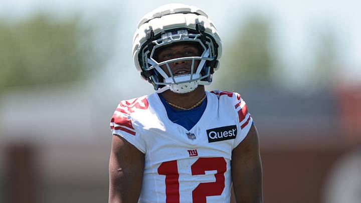 Jun 3, 2026; East Rutherford, NJ, USA;  New York Giants cornerback Colton Hood (12) participates in drills during organized team activities at Quest Diagnostics Training Center. Mandatory Credit: Vincent Carchietta-Imagn Images