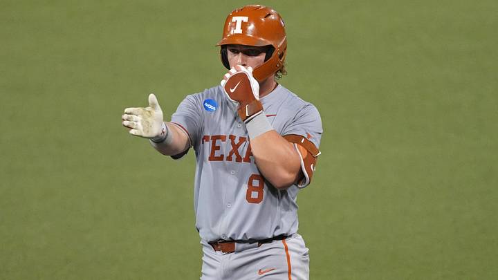 Texas Longhorns catcher Carson Tinney celebrates a single against the Oregon Ducks in the Austin Super Regional. Texas Longhorns catcher Carson Tinney celebrates a single against the Oregon Ducks in the Austin Super Regional.