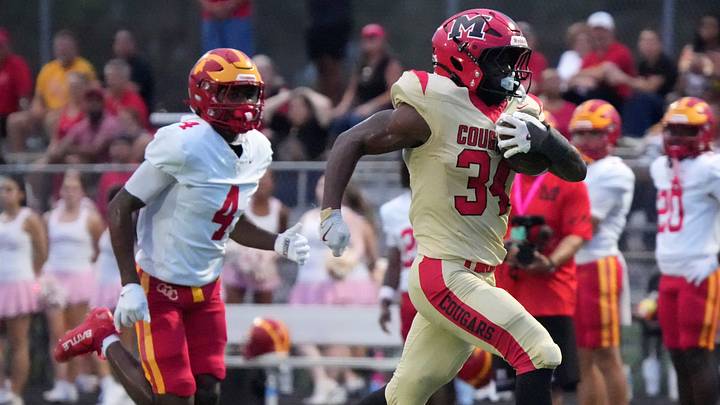 Cardinal Mooney running back Connail Jackson (34) heads for the end zone as Clearwater Central Catholic cornerback Daveo Belhomme (4) tries to chase him down in a game on Oct. 2, 2026. Mooney is ranked No. 9 in this week's High School On SI Florida Football Top 25. Cardinal Mooney running back Connail Jackson (34) heads for the end zone as Clearwater Central Catholic cornerback Daveo Belhomme (4) tries to chase him down in a game on Oct. 2, 2026. Mooney is ranked No. 9 in this week's High School On SI Florida Football Top 25.