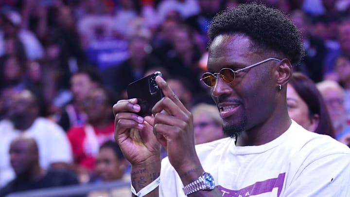 Suns forward Nigel Hayes-Davis take a photo during a Mercury and Fever game at PHX Arena in Phoenix on Aug. 7, 2025.