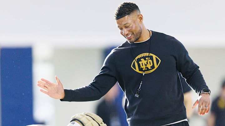 Notre Dame head coach Marcus Freeman greets his players during a Notre Dame football spring practice at Irish Athletic Center on Wednesday, March 19, 2025, in South Bend.