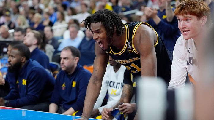 Michigan forward Morez Johnson Jr. (21) reacts to a play in the first half of their Final Four game against Arizona at Lucas Oil Stadium in Indianapolis on Saturday, April 4, 2026. Michigan forward Morez Johnson Jr. (21) reacts to a play in the first half of their Final Four game against Arizona at Lucas Oil Stadium in Indianapolis on Saturday, April 4, 2026.