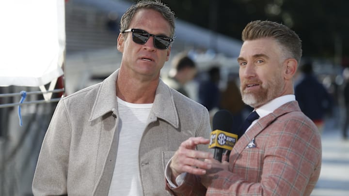 Mississippi Rebels head coach Lane Kiffin speaks with ESPN reporter Marty Smith before the game against the Mississippi State Bulldogs at Davis Wade Stadium at Scott Field.