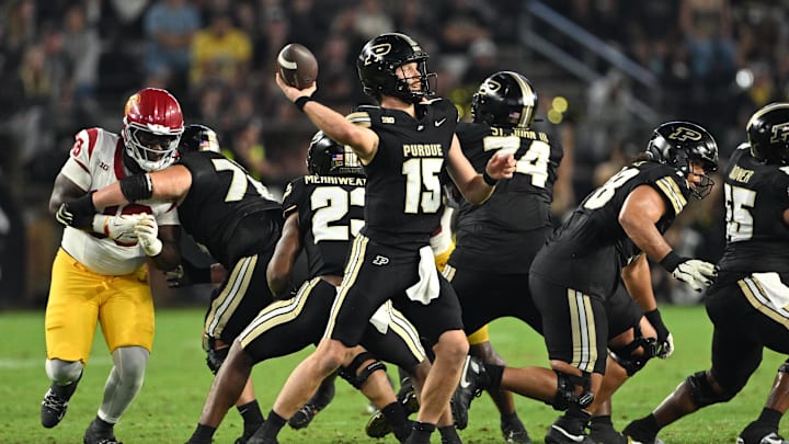 Sep 13, 2025; West Lafayette, Indiana, USA; Purdue Boilermakers quarterback Ryan Browne (15) throws a pass during the second half against the USC Trojans at Ross-Ade Stadium. Mandatory Credit: Marc Lebryk-Imagn Images