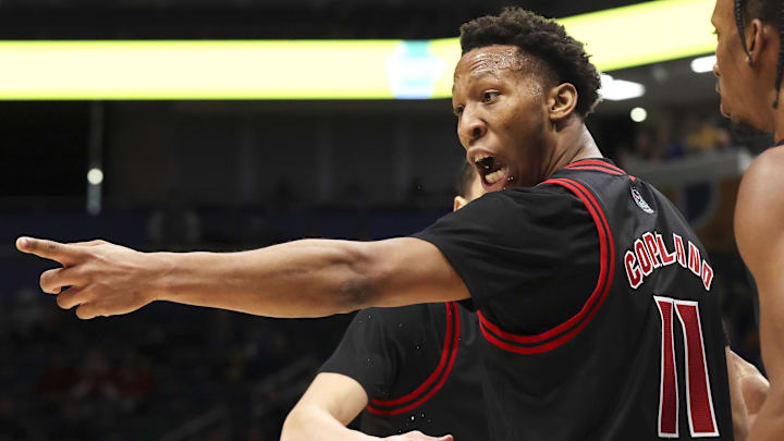 Jan 24, 2026; Pittsburgh, Pennsylvania, USA;  NC State Wolfpack guard Quadir Copeland (11) reacts to the Pittsburgh student section after a made basket against the Panthers during the second half at the Petersen Events Center. Mandatory Credit: Charles LeClaire-Imagn Images