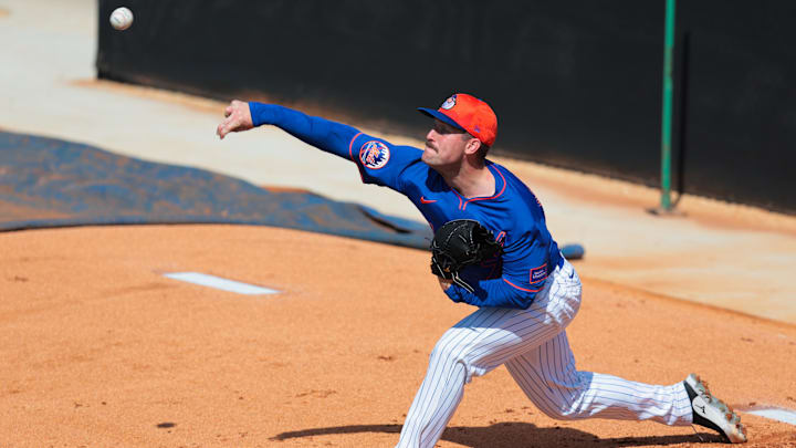New York Mets pitcher Sean Reid-Foley (71) pitches during a Spring Training workout at Clover Park in Port St. Lucie, Fla., on Feb. 12, 2025. New York Mets pitcher Sean Reid-Foley (71) pitches during a Spring Training workout at Clover Park in Port St. Lucie, Fla., on Feb. 12, 2025.