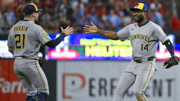 Sep 20, 2025; St. Louis, Missouri, USA; Milwaukee Brewers first baseman Andruw Monasterio (14) celebrates with third baseman Caleb Durbin (21) after the Brewers defeated the St. Louis Cardinals at Busch Stadium. Mandatory Credit: Jeff Curry-Imagn Images