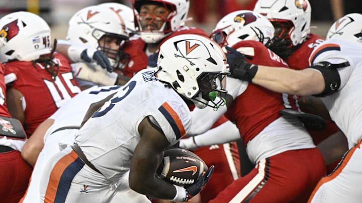 Oct 4, 2025; Louisville, Kentucky, USA; Virginia Cavaliers running back J'Mari Taylor (3) runs the ball in for a touchdown during the overtime against the Louisville Cardinals at L&N Federal Credit Union Stadium. Virginia defeated Louisville 30-27. Mandatory Credit: Jamie Rhodes-Imagn Images