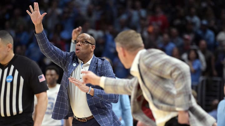 UNC basketball head coach Hubert Davis versus the Alabama Crimson Tide