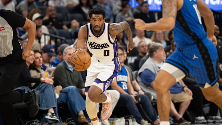 Mar 29, 2025; Orlando, Florida, USA; Sacramento Kings guard Malik Monk (0) dribbles the ball on a fast break against the Orlando Magic in the second quarter at Kia Center. Mandatory Credit: Jeremy Reper-Imagn Images Mar 29, 2025; Orlando, Florida, USA; Sacramento Kings guard Malik Monk (0) dribbles the ball on a fast break against the Orlando Magic in the second quarter at Kia Center. Mandatory Credit: Jeremy Reper-Imagn Images