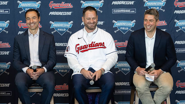 Nov 10, 2023; Cleveland, OH, USA; Cleveland Guardians manager Stephen Vogt, middle, and president of baseball operations Chris Antonetti, left, and general manager Mike Chernoff, right, talk to the media during an introductory press conference at Progressive Field. Mandatory Credit: Ken Blaze-Imagn Images
Nov 10, 2023; Cleveland, OH, USA; Cleveland Guardians manager Stephen Vogt, middle, and president of baseball operations Chris Antonetti, left, and general manager Mike Chernoff, right, talk to the media during an introductory press conference at Progressive Field. Mandatory Credit: Ken Blaze-Imagn Images