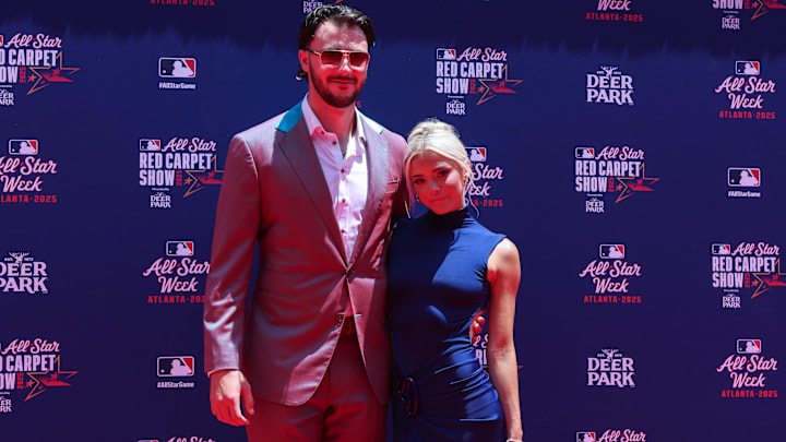 Jul 15, 2025; Atlanta, GA, USA; National League pitcher Paul Skenes (30) of the Pittsburgh Pirates and social media influencer Livvy Dunne pose for a photo on the red carpet before the 2025 MLB All Star Game at Truist Park. Mandatory Credit: Brett Davis-Imagn Images