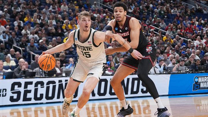 Mar 21, 2026; Buffalo, NY, USA; Michigan State Spartans center Carson Cooper (15) drives to the basket in the second half against the Louisville Cardinals during a second round game of the men's 2026 NCAA Tournament at Keybank Center. Mandatory Credit: Gregory Fisher-Imagn Images Mar 21, 2026; Buffalo, NY, USA; Michigan State Spartans center Carson Cooper (15) drives to the basket in the second half against the Louisville Cardinals during a second round game of the men's 2026 NCAA Tournament at Keybank Center. Mandatory Credit: Gregory Fisher-Imagn Images