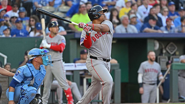 May 10, 2025; Kansas City, Missouri, USA; Boston Red Sox designated hitter Rafael Devers (11) hits an RBI double in the third inning against the Kansas City Royals at Kauffman Stadium. Mandatory Credit: Peter Aiken-Imagn Images May 10, 2025; Kansas City, Missouri, USA; Boston Red Sox designated hitter Rafael Devers (11) hits an RBI double in the third inning against the Kansas City Royals at Kauffman Stadium. Mandatory Credit: Peter Aiken-Imagn Images