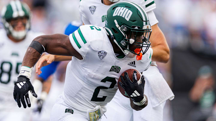 Sep 21, 2024; Lexington, Kentucky, USA; Ohio Bobcats running back Anthony Tyus III (2) runs the ball during the first quarter against the Kentucky Wildcats at Kroger Field. Mandatory Credit: Jordan Prather-Imagn Images