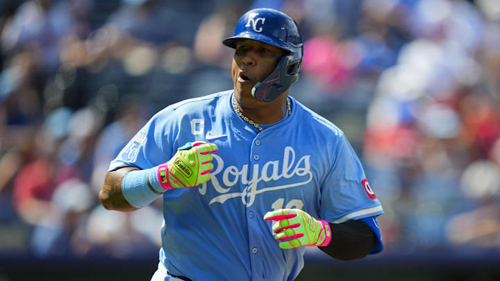 Jul 30, 2025; Kansas City, Missouri, USA; Kansas City Royals designated hitter Salvador Perez (13) celebrates after hitting a walk-off during the tenth inning against the Atlanta Braves at Kauffman Stadium. Mandatory Credit: Jay Biggerstaff-Imagn Images
