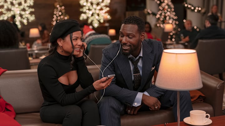 Meet Me Next Christmas. (L to R) Christina Milian as Layla and Kofie Sirboe as James in Meet Me Next Christmas