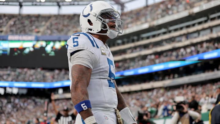 Nov 17, 2024; East Rutherford, New Jersey, USA; Indianapolis Colts quarterback Anthony Richardson (5) celebrates his touchdown against the New York Jets during the fourth quarter at MetLife Stadium. Mandatory Credit: Brad Penner-Imagn Images