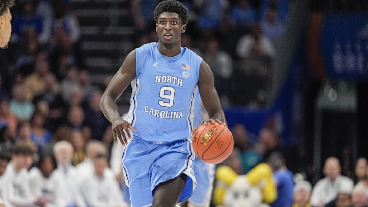 Mar 14, 2025; Charlotte, NC, USA; North Carolina Tar Heels guard Drake Powell (9) during the first half against the Duke Blue Devils at Spectrum Center. Mandatory Credit: Jim Dedmon-Imagn Images Mar 14, 2025; Charlotte, NC, USA; North Carolina Tar Heels guard Drake Powell (9) during the first half against the Duke Blue Devils at Spectrum Center. Mandatory Credit: Jim Dedmon-Imagn Images