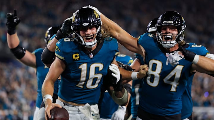 Jacksonville Jaguars quarterback Trevor Lawrence (16) celebrates his game-winning touchdown as tight end Hunter Long (84) reacts during the fourth quarter of an NFL football matchup at EverBank Stadium, Monday, Oct. 6, 2025, in Jacksonville, Fla. The Jacksonville Jaguars edged the Kansas City Chiefs 31-28. [Corey Perrine/Florida Times-Union]