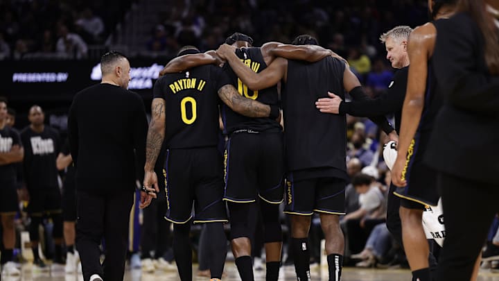 Jonathan Kuminga helped Jimmy Butler to the locker room after he tore his ACL.