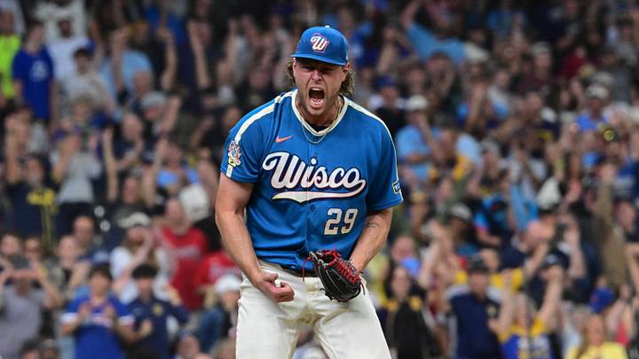 Aug 21, 2026; Milwaukee, Wisconsin, USA;  Milwaukee Brewers pitcher Trevor Megill (29) reacts after picking up a save against the Atlanta Braves at American Family Field.  Mandatory Credit: Benny Sieu-Imagn Images