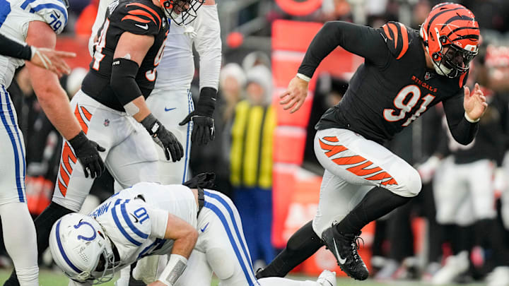 Cincinnati Bengals defensive end Trey Hendrickson (91) runs back to the sideline after sacking Indianapolis Colts quarterback Gardner Minshew II (10) on Sunday, Dec. 10, 2023, during a game against the Cincinnati Bengals at Paycor Stadium in Cincinnati.