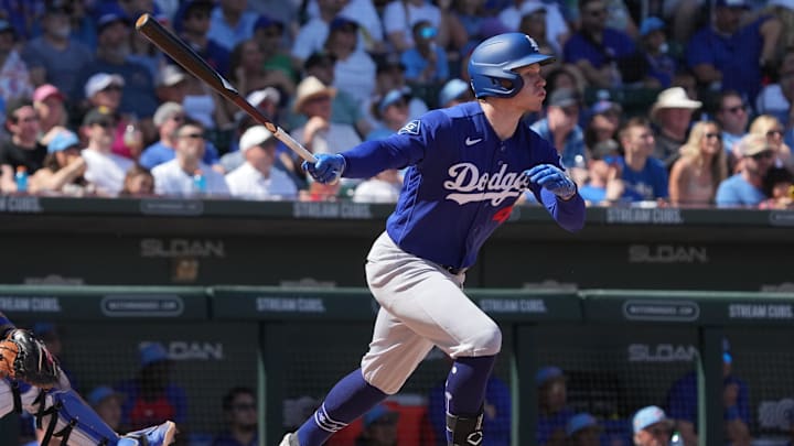 Mar 15, 2026; Mesa, Arizona, USA; Los Angeles Dodgers right fielder Jack Suwinski hits a three run home run against the Chicago Cubs in the first inning at Sloan Park. Mandatory Credit: Rick Scuteri-Imagn Images