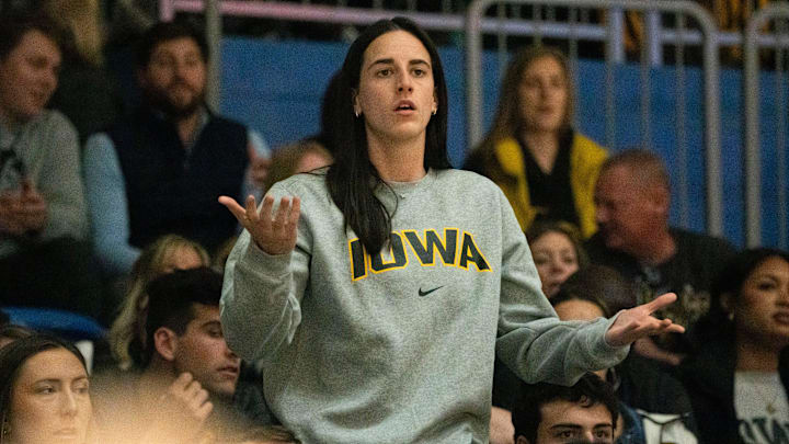 Former Iowa women's basketball player Caitlin Clark reacts after a foul call on Iowa during the Drake vs. Iowa basketball game at Knapp Center on Sunday, Nov. 17, 2024, in Des Moines.