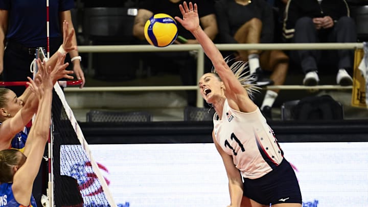 Annie Drews  (11) of the USAS spikes the ball against the Netherlands during the USA Volleyball Cup at The Walter Pyramid