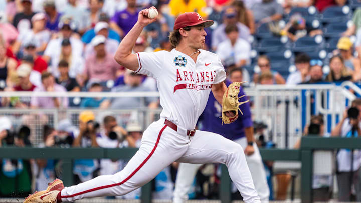 Jun 14, 2025; Omaha, Neb, USA; Arkansas Razorbacks pitcher Gabe Gaeckle (20) pitches against the LSU Tigers during the second inning at Charles Schwab Field. Mandatory Credit: Dylan Widger-Imagn Images