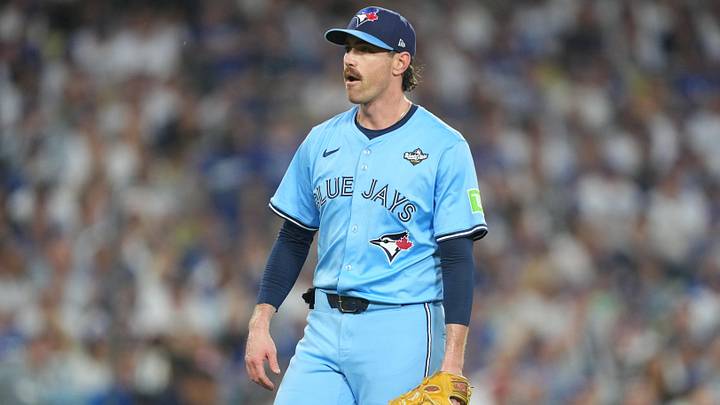 Oct 28, 2025; Los Angeles, California, USA; Toronto Blue Jays pitcher Shane Bieber (57) reacts in the third inning against the Los Angeles Dodgers during game four of the 2025 MLB World Series at Dodger Stadium. Mandatory Credit: Kirby Lee-Imagn Images