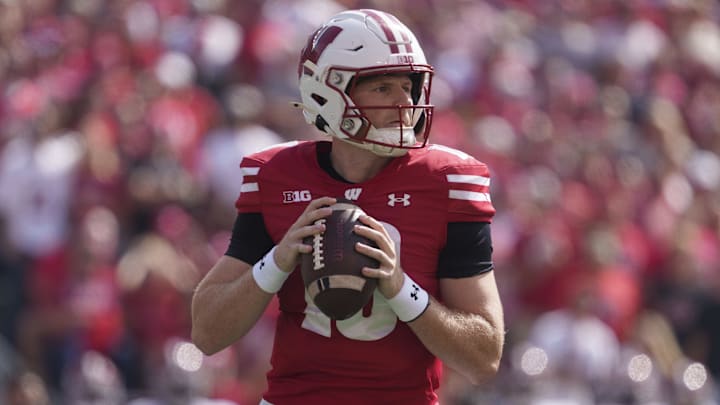Sep 14, 2024; Madison, Wisconsin, USA;  Wisconsin Badgers quarterback Tyler Van Dyke (10) during the game against the Alabama Crimson Tide at Camp Randall Stadium. Mandatory Credit: Jeff Hanisch-Imagn Images