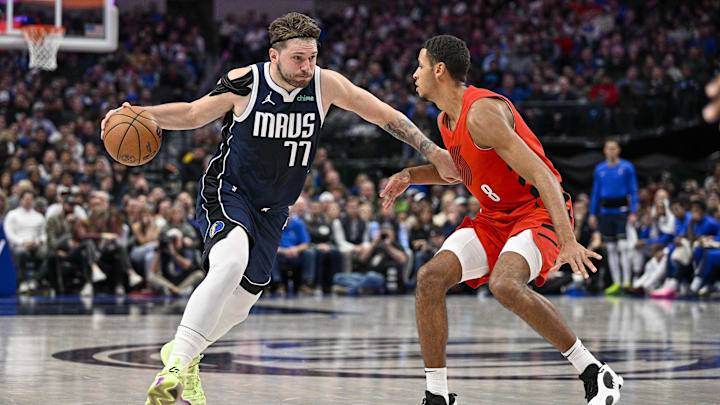 Jan 3, 2024; Dallas, Texas, USA; Dallas Mavericks guard Luka Doncic (77) drives to the basket past