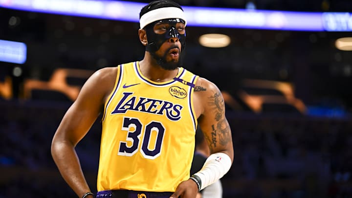 Apr 11, 2025; Los Angeles, California, USA; Los Angeles Lakers guard Jordan Goodwin (30) reacts against the Houston Rockets during the first half at Crypto.com Arena. Mandatory Credit: Jonathan Hui-Imagn Images