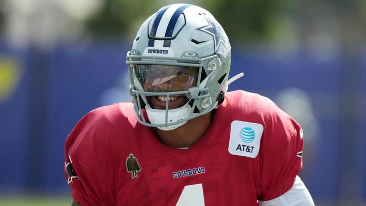 Dallas Cowboys quarterback Dak Prescott reacts during a joint practice against the Los Angeles Rams. Dallas Cowboys quarterback Dak Prescott reacts during a joint practice against the Los Angeles Rams.