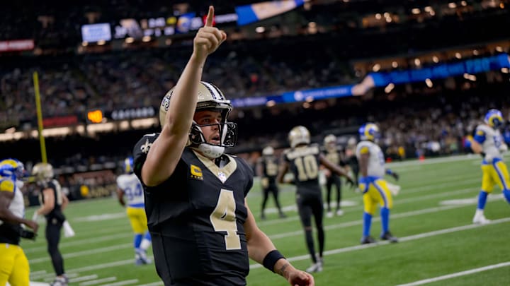 Dec 1, 2024; New Orleans, Louisiana, USA; New Orleans Saints quarterback Derek Carr (4) reacts after rushing for a first down against the Los Angeles Rams during the fourth quarter at Caesars Superdome. Mandatory Credit: Matthew Hinton-Imagn Images Dec 1, 2024; New Orleans, Louisiana, USA; New Orleans Saints quarterback Derek Carr (4) reacts after rushing for a first down against the Los Angeles Rams during the fourth quarter at Caesars Superdome. Mandatory Credit: Matthew Hinton-Imagn Images