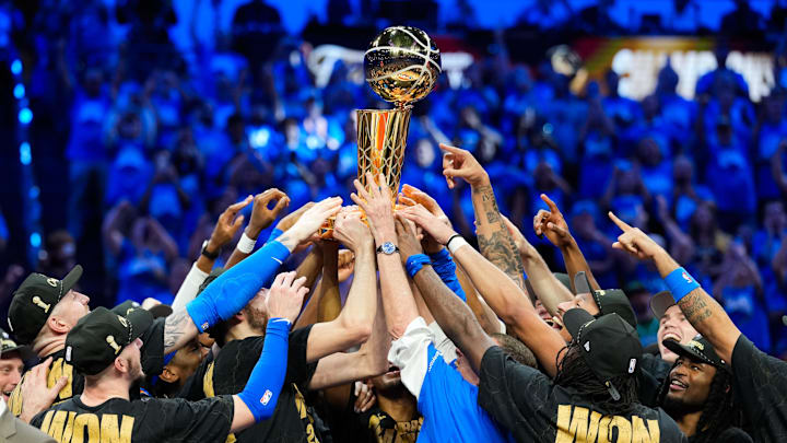 Jun 22, 2025; Oklahoma City, Oklahoma, USA; Oklahoma City Thunder players lift the Larry O'Brien Championship Trophy after winning Game 7 of the 2025 NBA Finals against the Indiana Pacers at Paycom Center. Mandatory Credit: Kyle Terada-Imagn Images